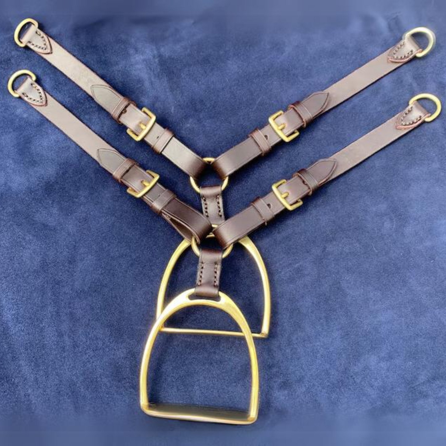 Miniature stirrup iron leather curtain tie backs.