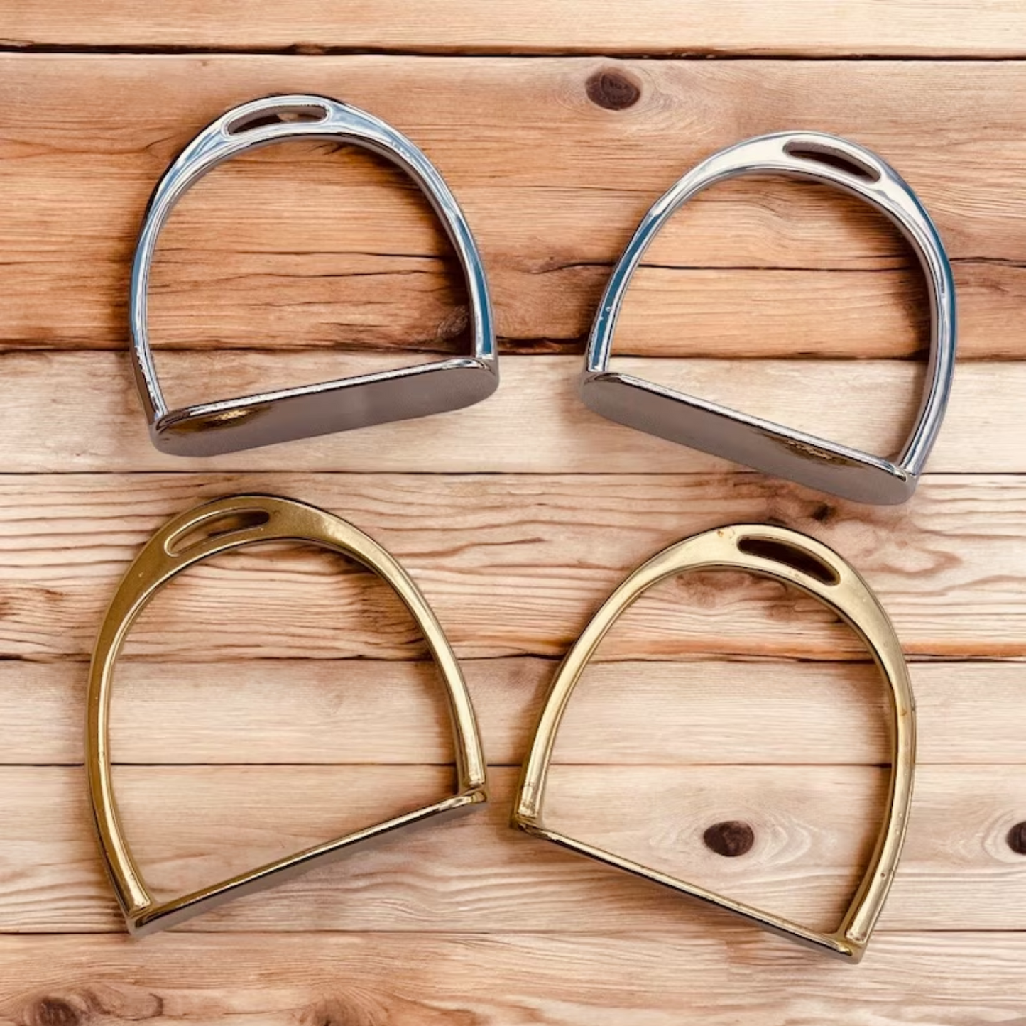 Miniature stirrup iron leather curtain tie backs.
